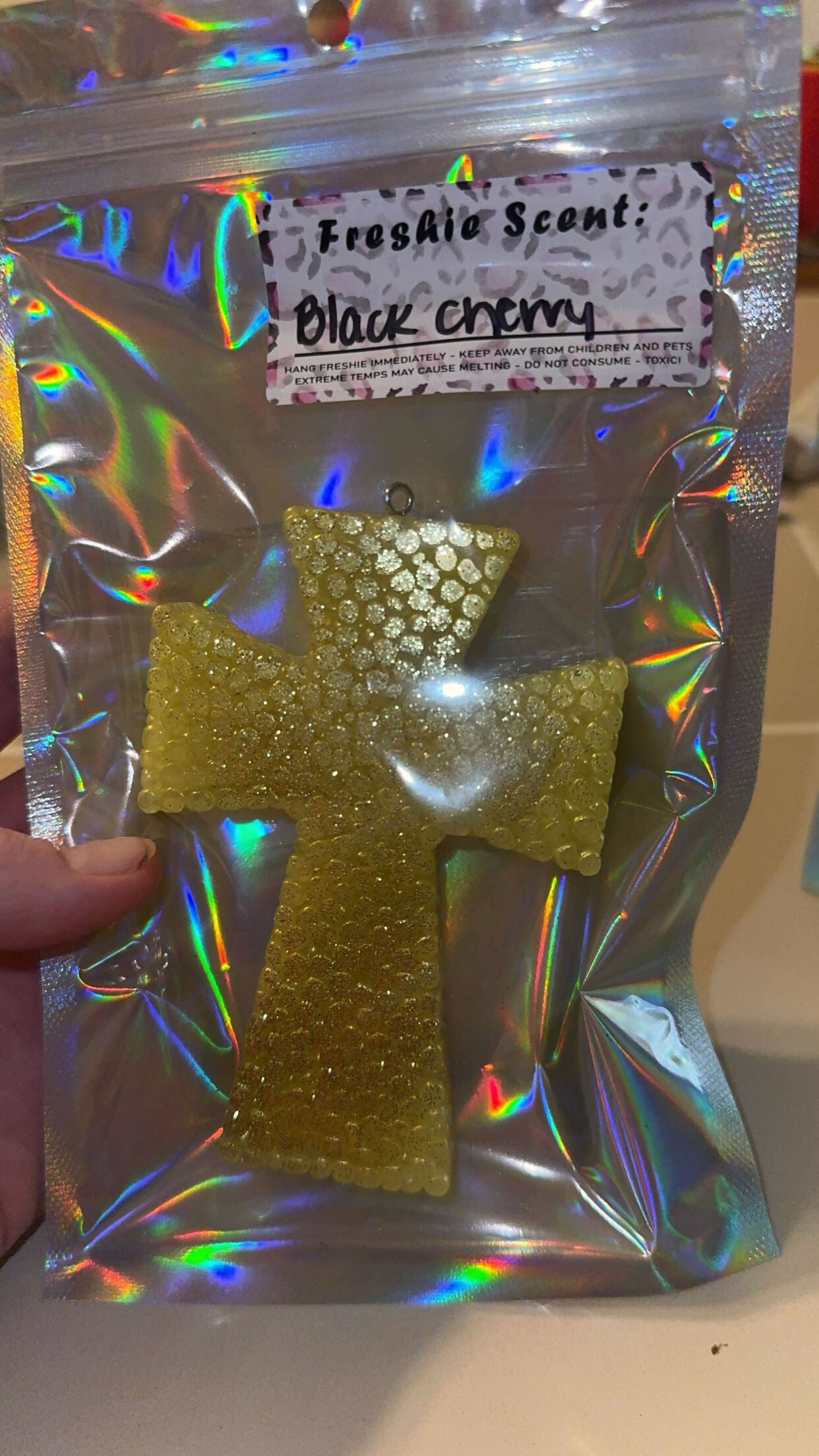 gold cross- black cherry